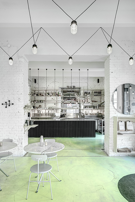 Phill's Corner Bistro Interior Design | mint-green concrete floor