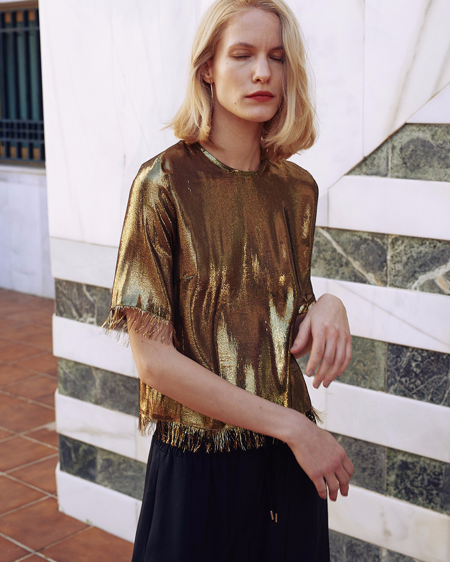 Relaxed fit woven top in a slightly see-through silk mix fabric. #fringes